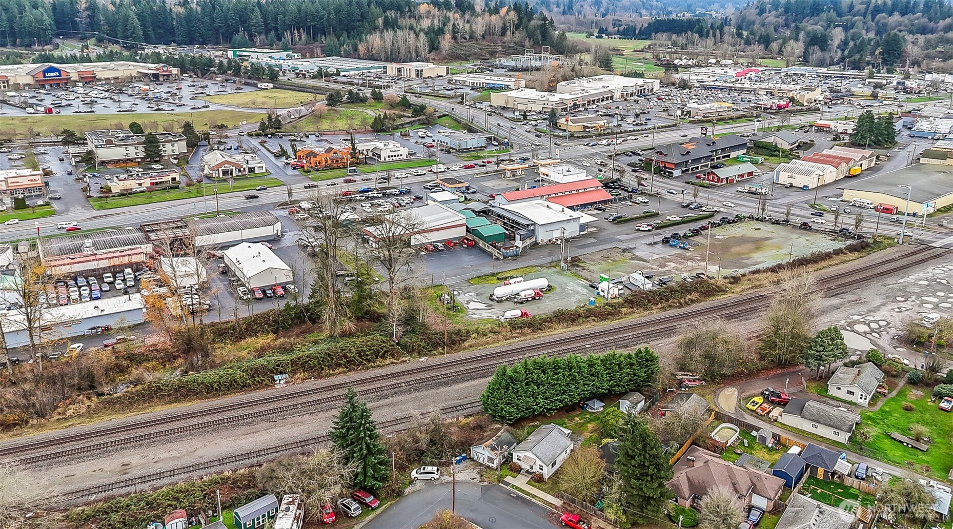 335 North Madison Street Monroe, WA 98272 - Photo 34 of 38 an aerial view of residential houses and outdoor space