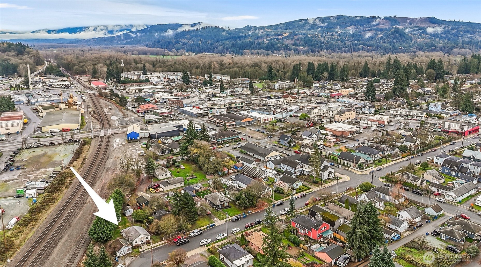 335 North Madison Street Monroe, WA 98272 - Photo 38 of 38 a view of a lake with mountains in the background