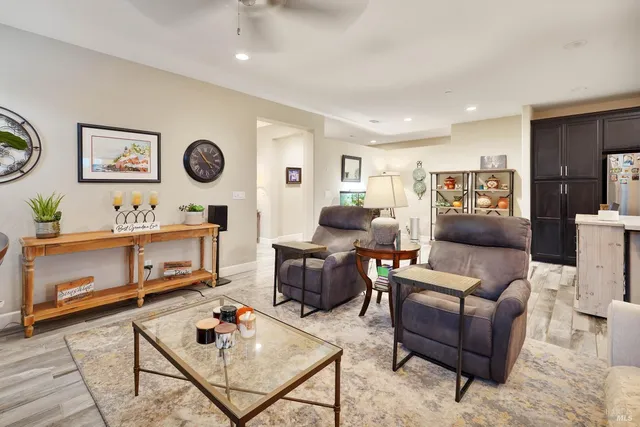 a living room with furniture and a table