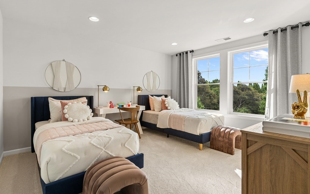 2 Cooley Drive, Unit 15 Woburn, MA 01801 - Photo 32 of 34 a bedroom with bed and a large window