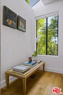 a view of a balcony with chair and table of the balcony