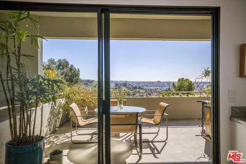 a bathroom with a sink and a window