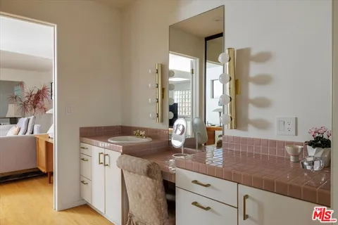 a bathroom with a bathtub and shower