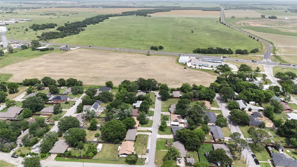 377 Pilot Point Pilot Point, TX 76258 - Photo 7 of 10 Aerial view of property and surrounding area featuring rural landscape and agricultural land