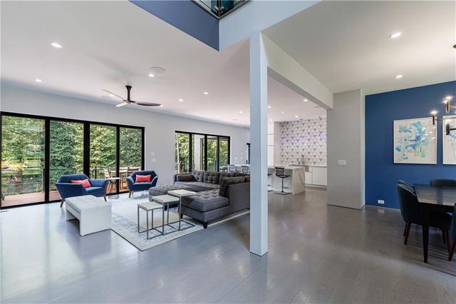 a bedroom with a bed and a chair