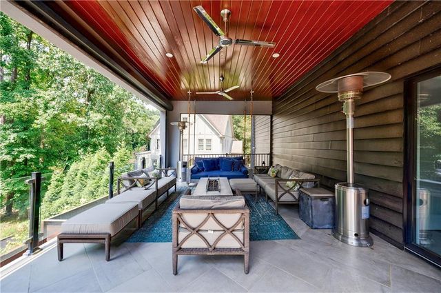 a bathroom with a double vanity sink and a large mirror