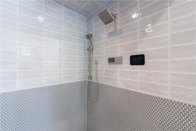 a view of yard from deck having patio