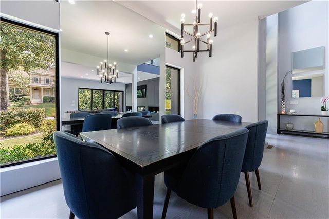a dining room with a table or chairs and a wooden floor