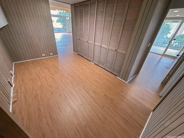 a view of outdoor space with wooden floor