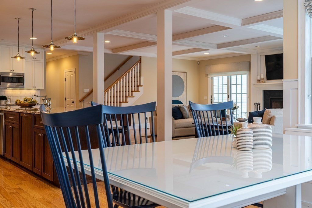 157 Walpole Street Dover, MA 02030 - Photo 12 of 38 a dining room with furniture entryway and wooden floor