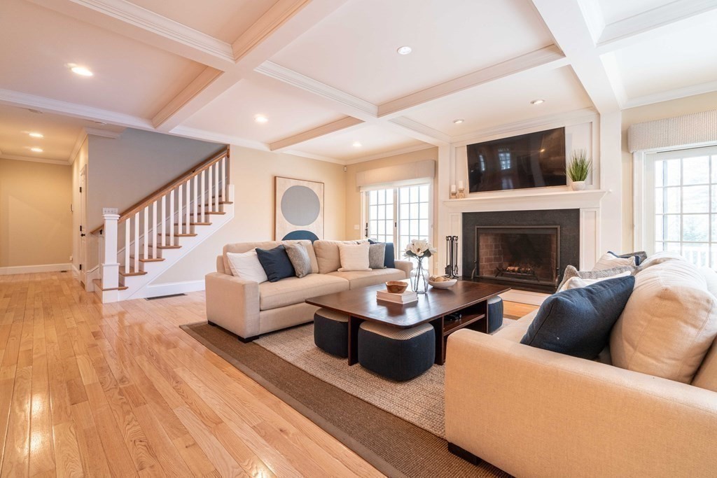 157 Walpole Street Dover, MA 02030 - Photo 16 of 38 a living room with furniture and a fireplace