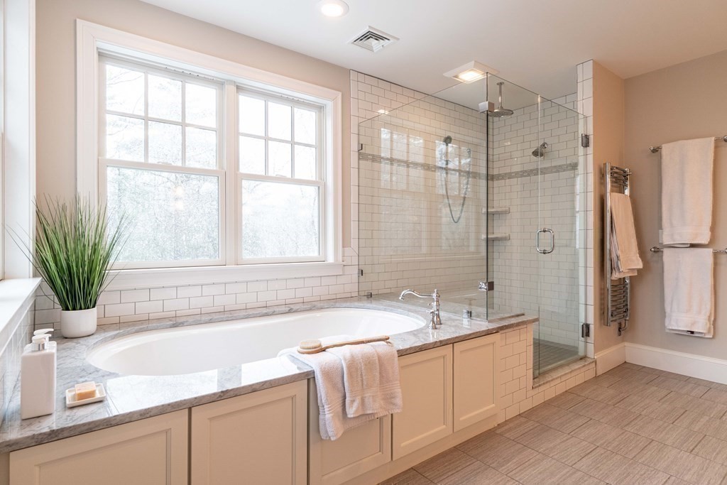 157 Walpole Street Dover, MA 02030 - Photo 26 of 38 a bathroom with a granite countertop tub sink and mirror