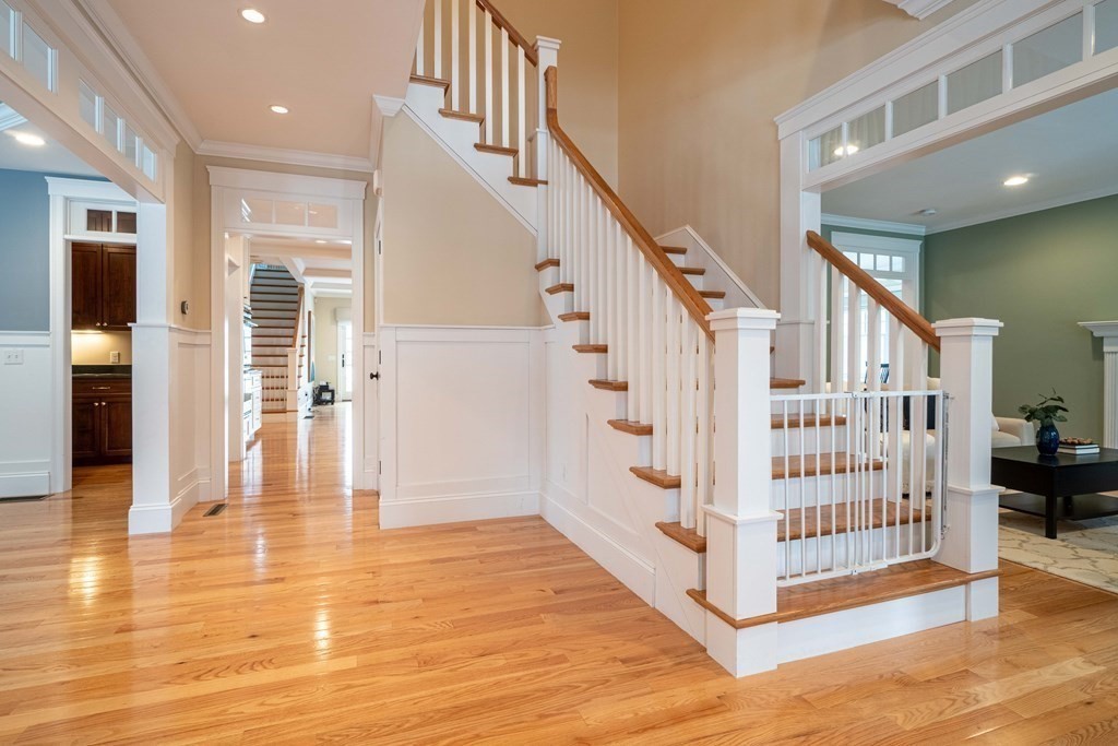 157 Walpole Street Dover, MA 02030 - Photo 3 of 38 a view of entryway with livingroom and wooden floor