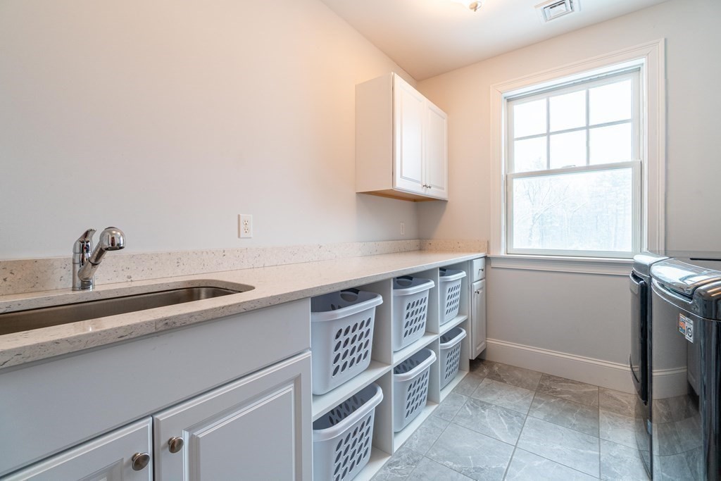 157 Walpole Street Dover, MA 02030 - Photo 33 of 38 a kitchen with a sink and a window