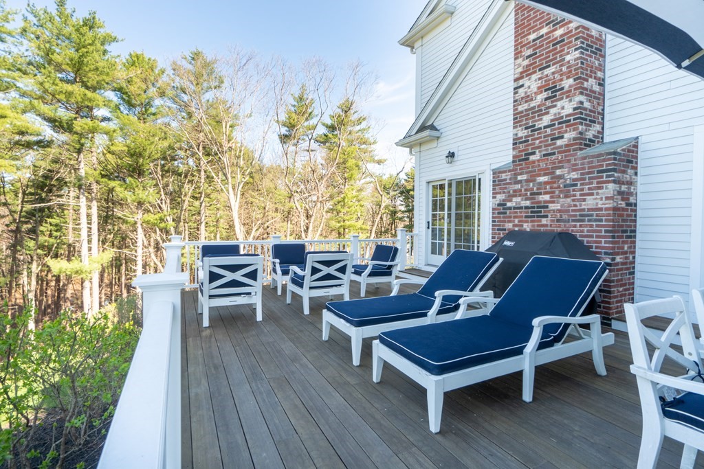 157 Walpole Street Dover, MA 02030 - Photo 35 of 38 a outdoor living space with furniture and wooden floor
