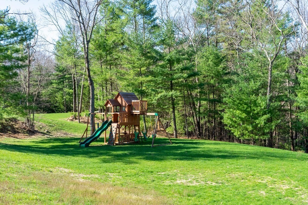 157 Walpole Street Dover, MA 02030 - Photo 36 of 38 a view of a park with a slide