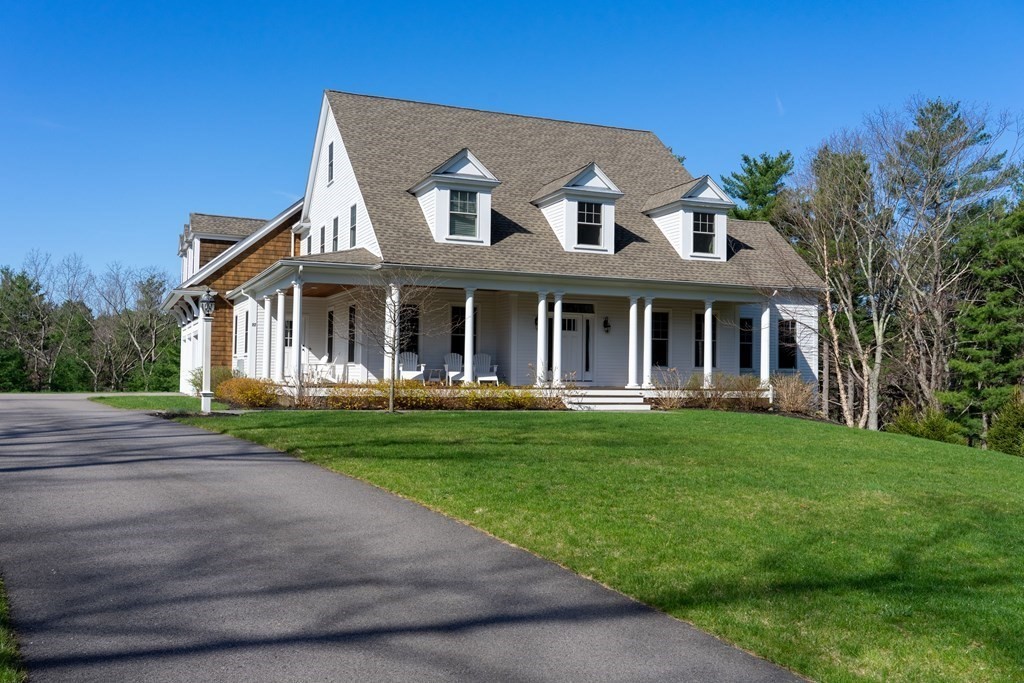 157 Walpole Street Dover, MA 02030 - Photo 37 of 38 front view of a house with a yard
