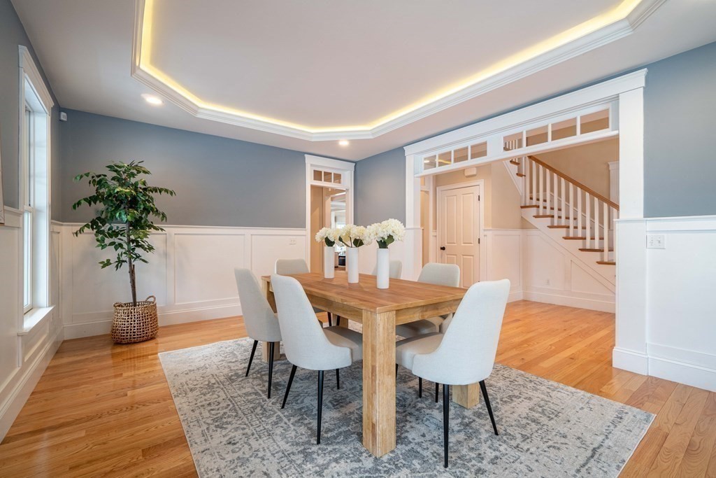 157 Walpole Street Dover, MA 02030 - Photo 5 of 38 a view of a dining room with furniture and wooden floor
