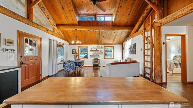 a view of a living room and kitchen