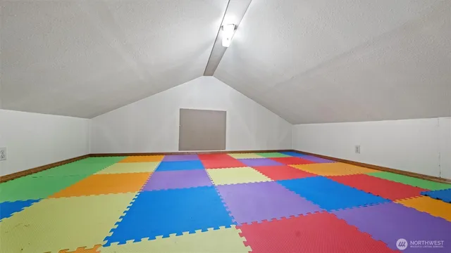 a room with pool and stairs