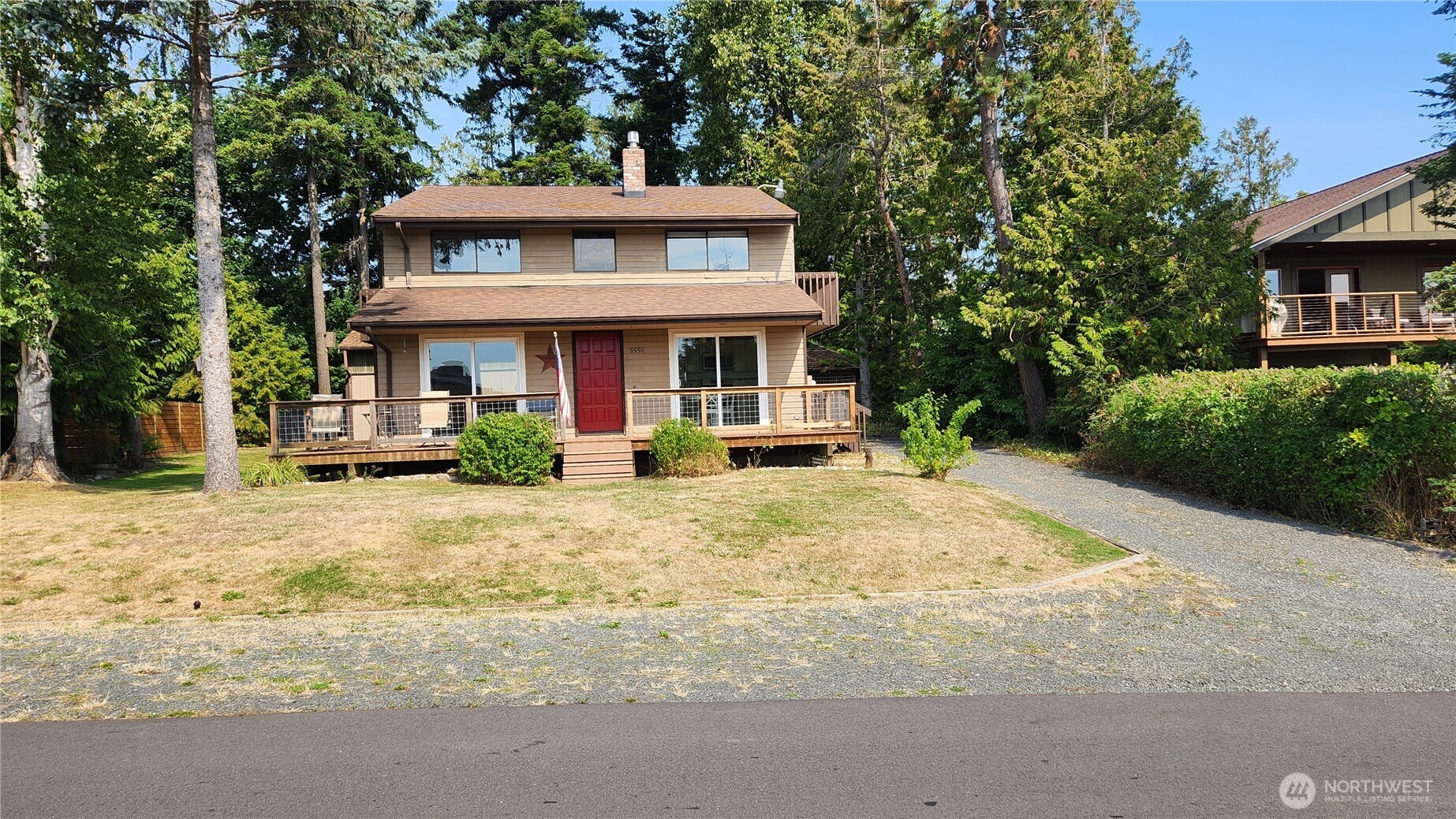 5556 Salish Road Blaine, WA 98230 - Photo 1 of 40 a front view of a house with a yard