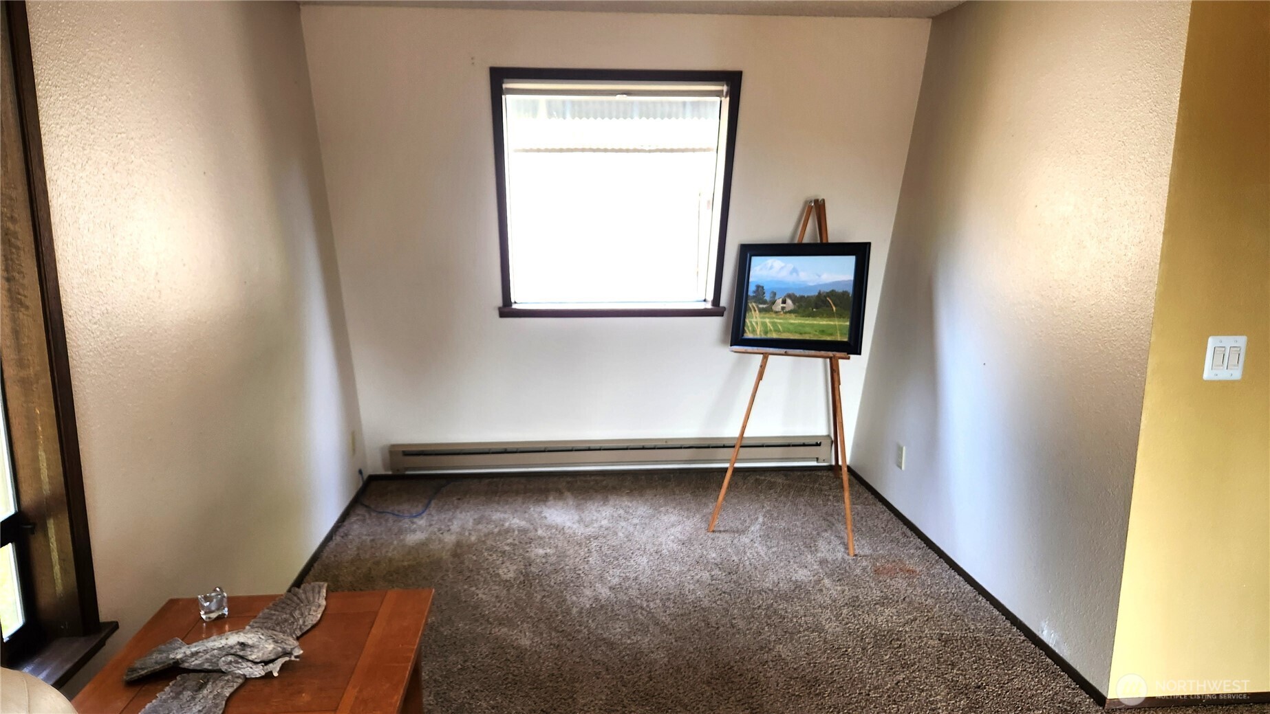 5556 Salish Road Blaine, WA 98230 - Photo 13 of 40 a view of room with window and wooden floor