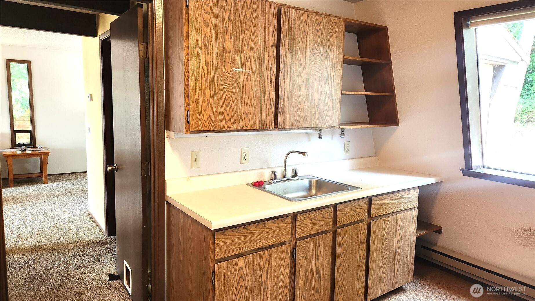 5556 Salish Road Blaine, WA 98230 - Photo 16 of 40 a bathroom with a sink and a mirror