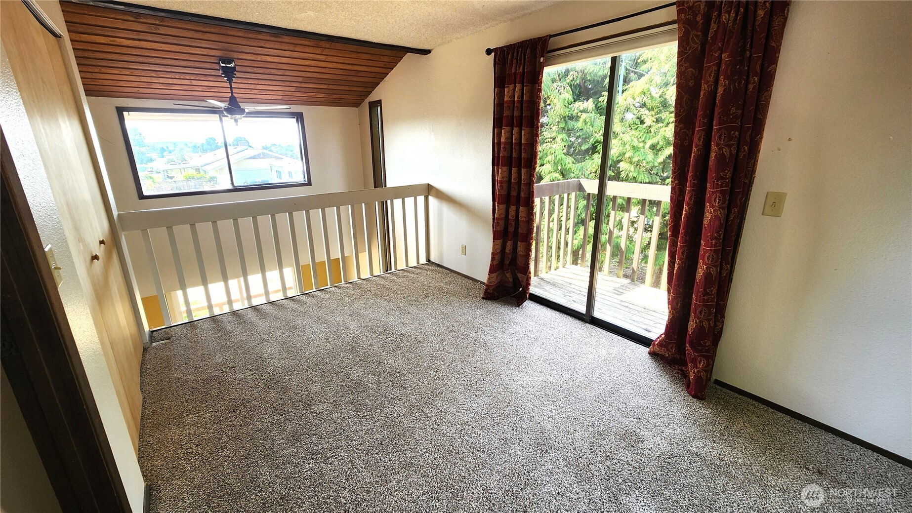 5556 Salish Road Blaine, WA 98230 - Photo 24 of 40 a view of a room with large windows