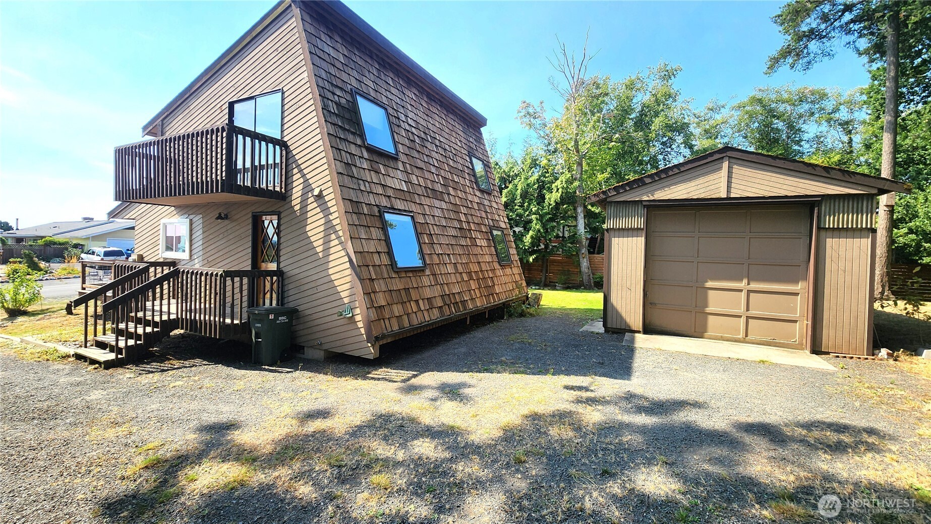 5556 Salish Road Blaine, WA 98230 - Photo 32 of 40 a view of a house with a yard
