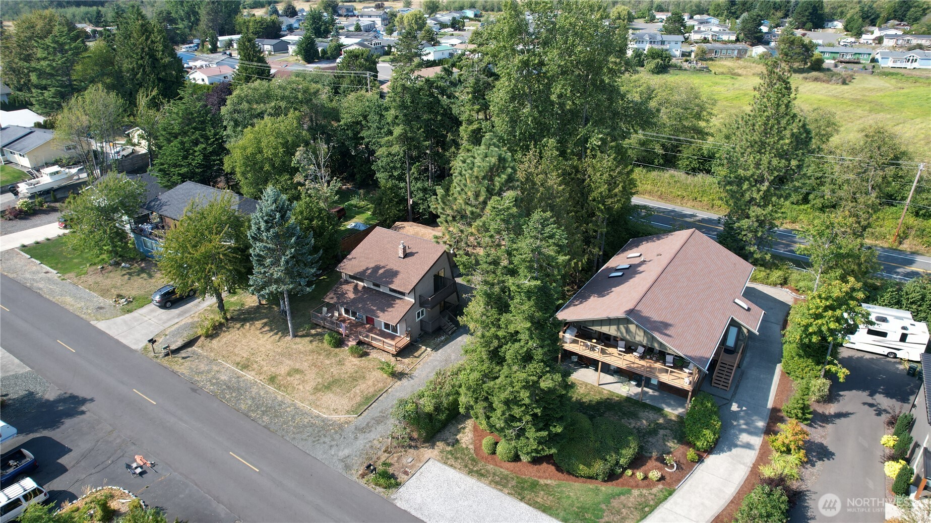 5556 Salish Road Blaine, WA 98230 - Photo 39 of 40 an aerial view of a house with yard swimming pool and outdoor seating