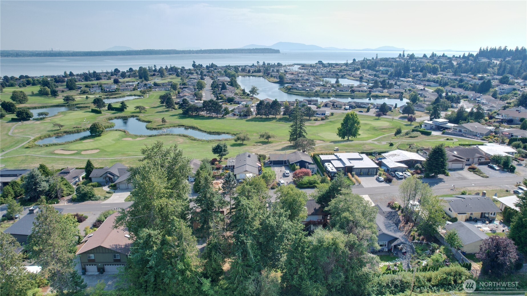 5556 Salish Road Blaine, WA 98230 - Photo 40 of 40 an aerial view of a city with lots of residential buildings