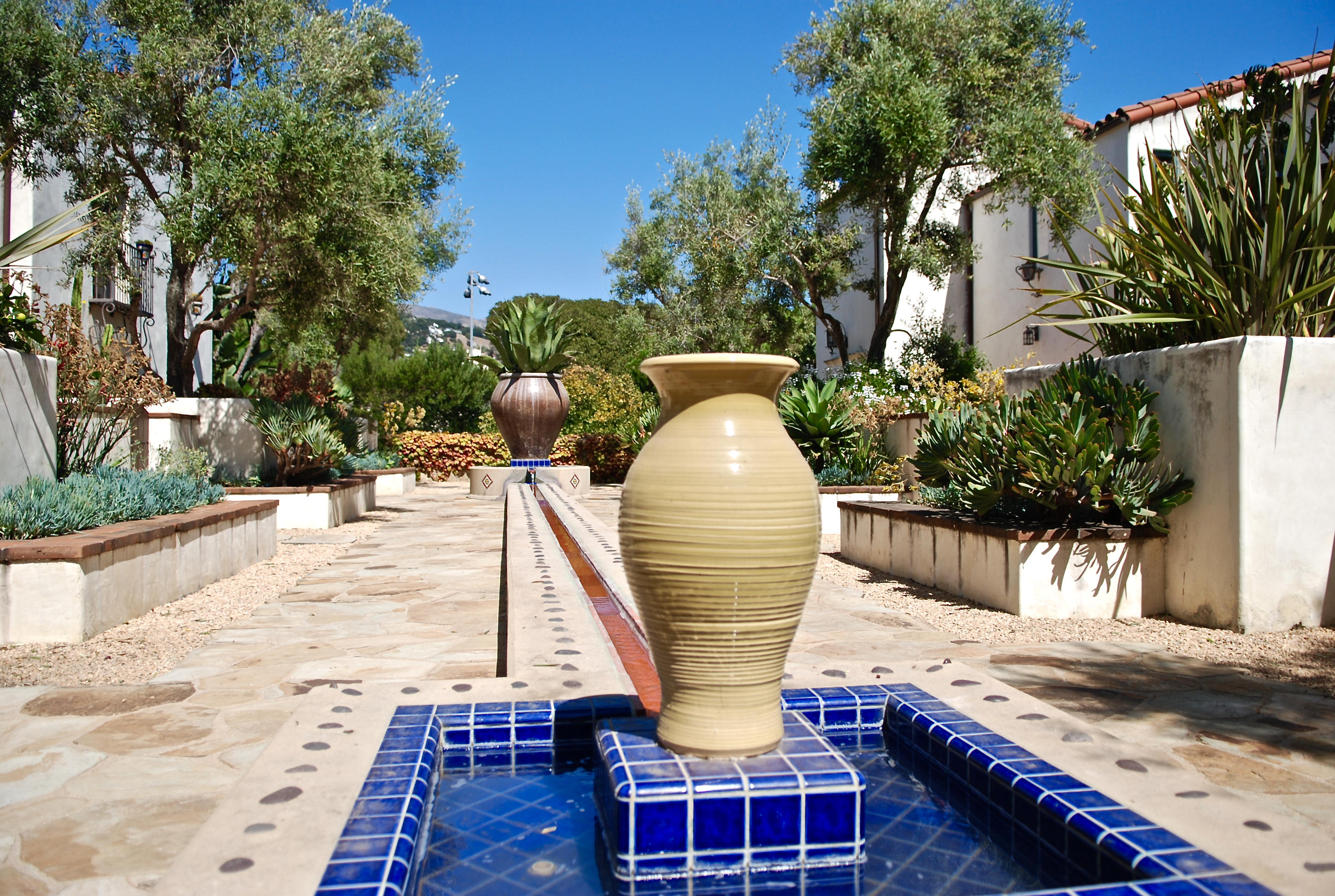 1011 Rinconada Road, Unit E Santa Barbara, CA 93101 - Photo 36 of 48 Courtyard Yellow Pot
