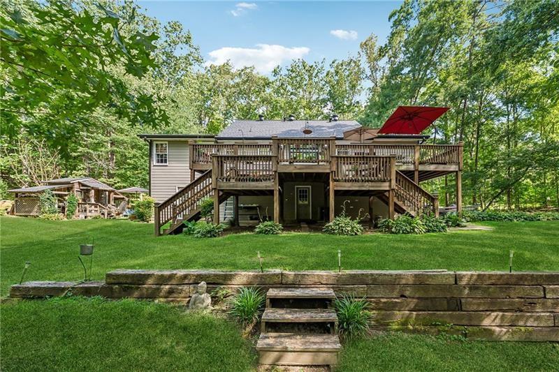 315 Rhine Road Southeast White, GA 30184 - Photo 23 of 59 a front view of a house with a yard