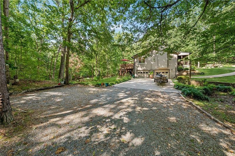 315 Rhine Road Southeast White, GA 30184 - Photo 40 of 59 a view of a tree in front of a house