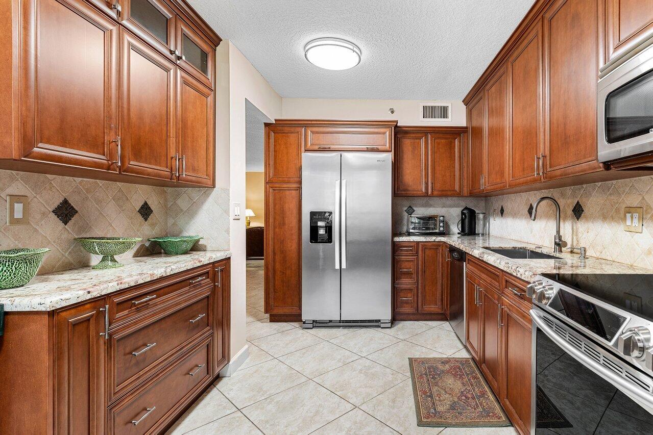 7129 Promenade Drive, Unit 102 Boca Raton, FL 33433 - Photo 2 of 38 006-7129PromenadeDrive-102-BocaRaton-FL-