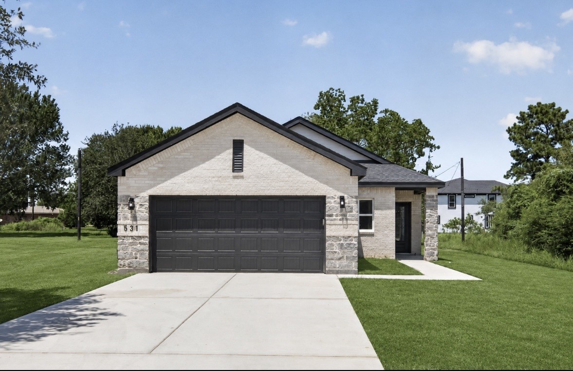 531 Oleander Street Prairie View, TX 77484 - Photo 1 of 15 Stone and brick in the front of the home