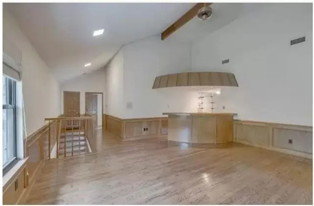 a view of a kitchen with furniture and counter space