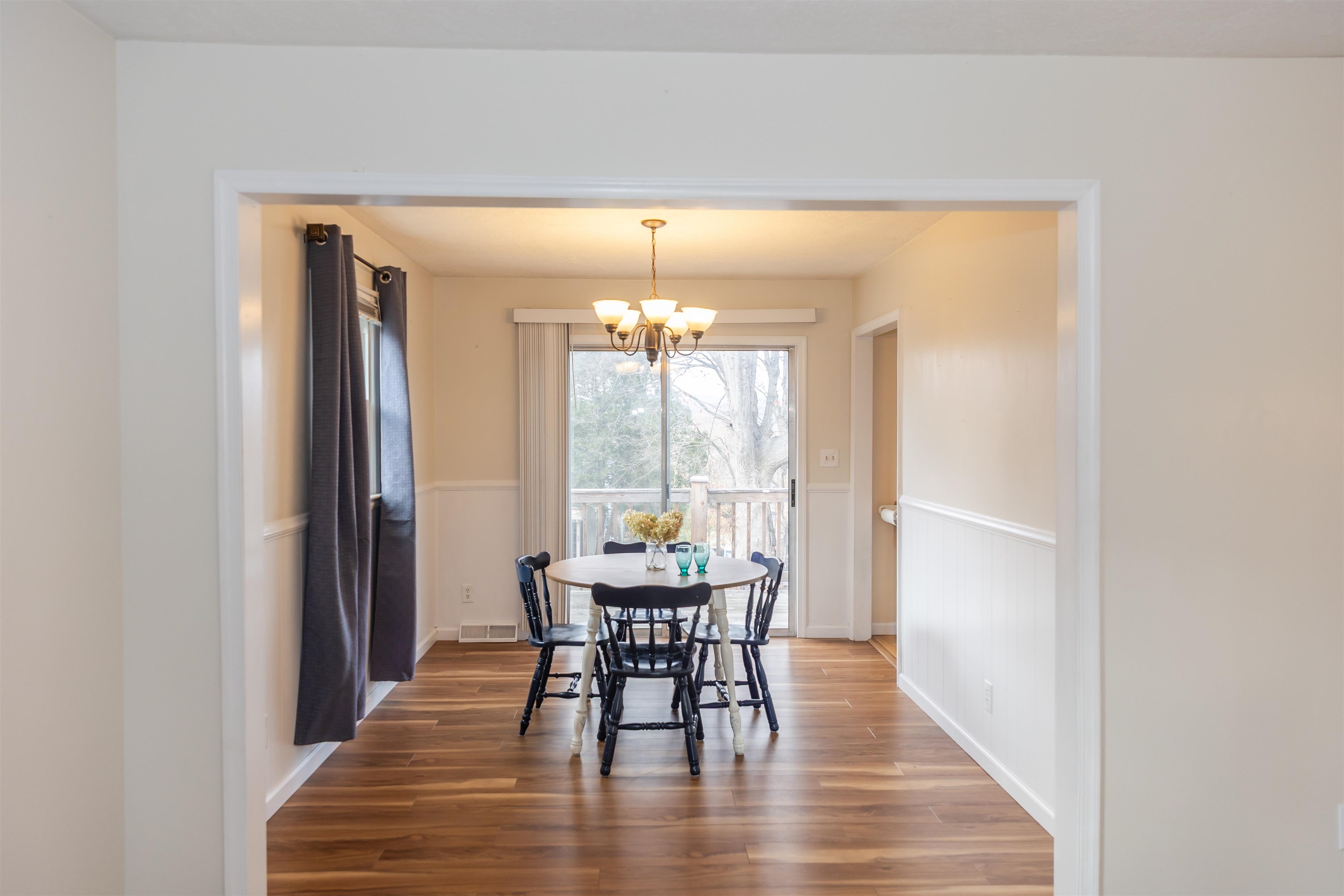 303 Summit Street Lexington, VA 24450 - Photo 17 of 58 a view of a dining room with furniture window and wooden floor