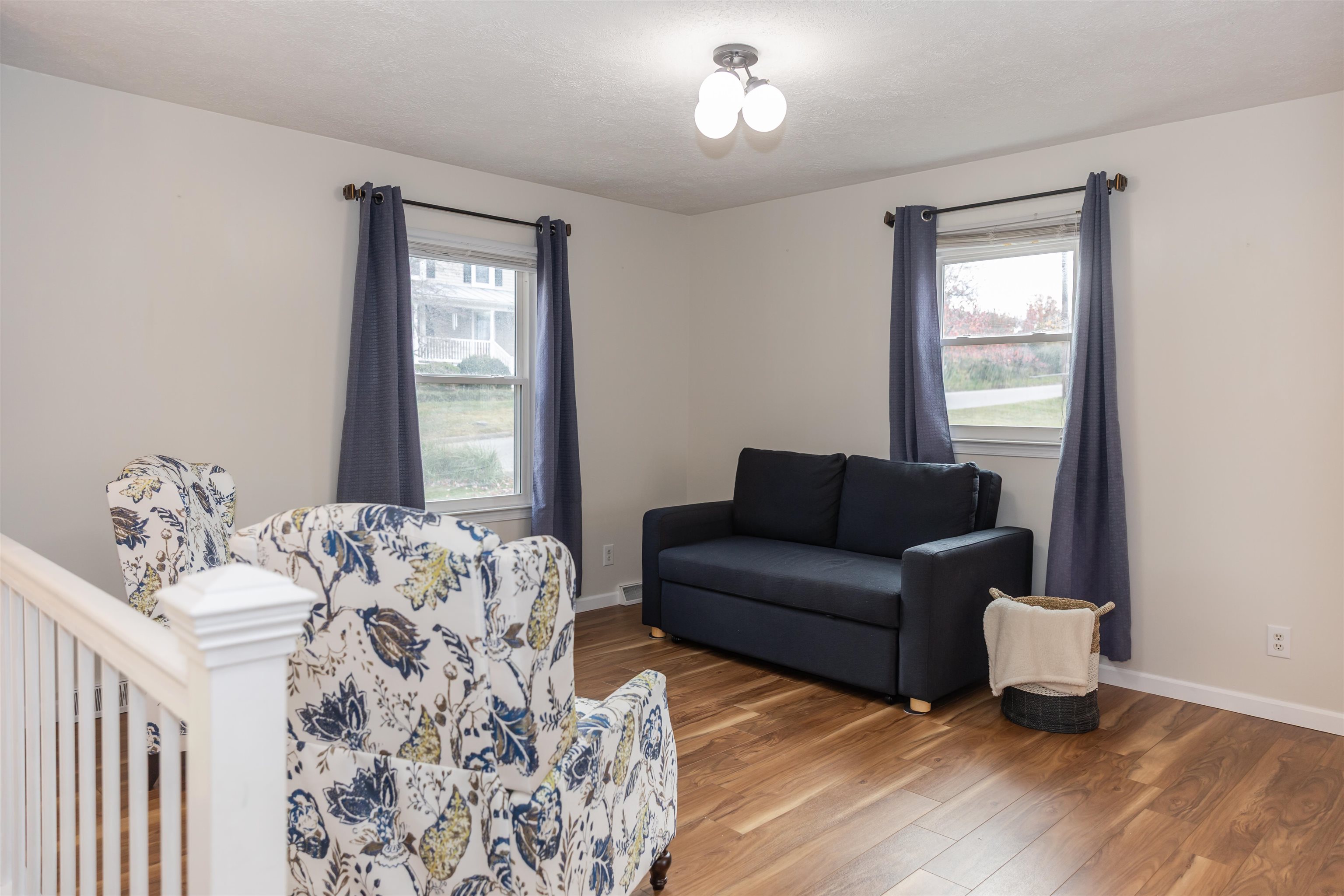 303 Summit Street Lexington, VA 24450 - Photo 19 of 58 a living room with furniture and windows