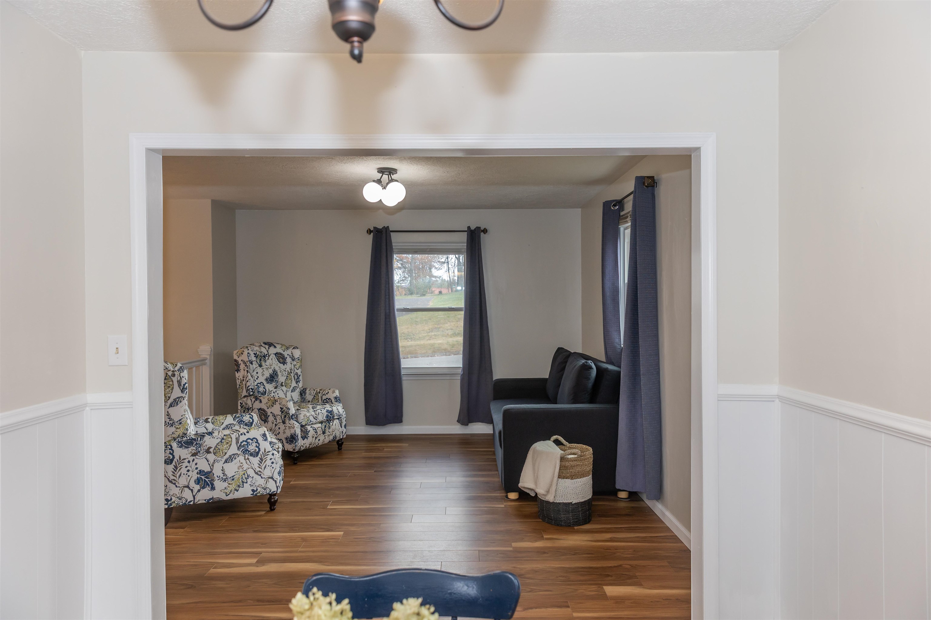 303 Summit Street Lexington, VA 24450 - Photo 22 of 58 a view of living room with furniture and wooden floor