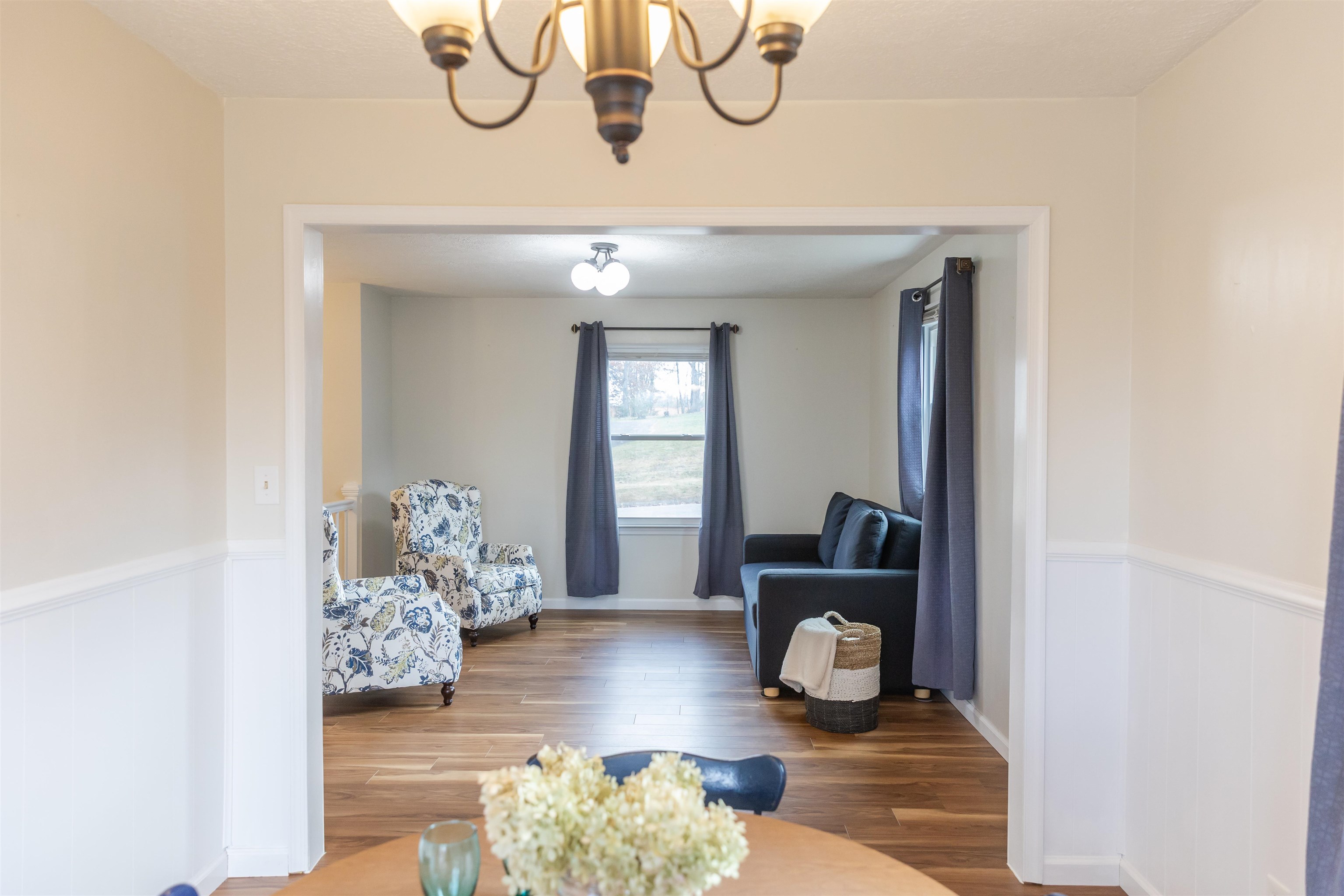 303 Summit Street Lexington, VA 24450 - Photo 23 of 58 a living room with furniture and wooden floor