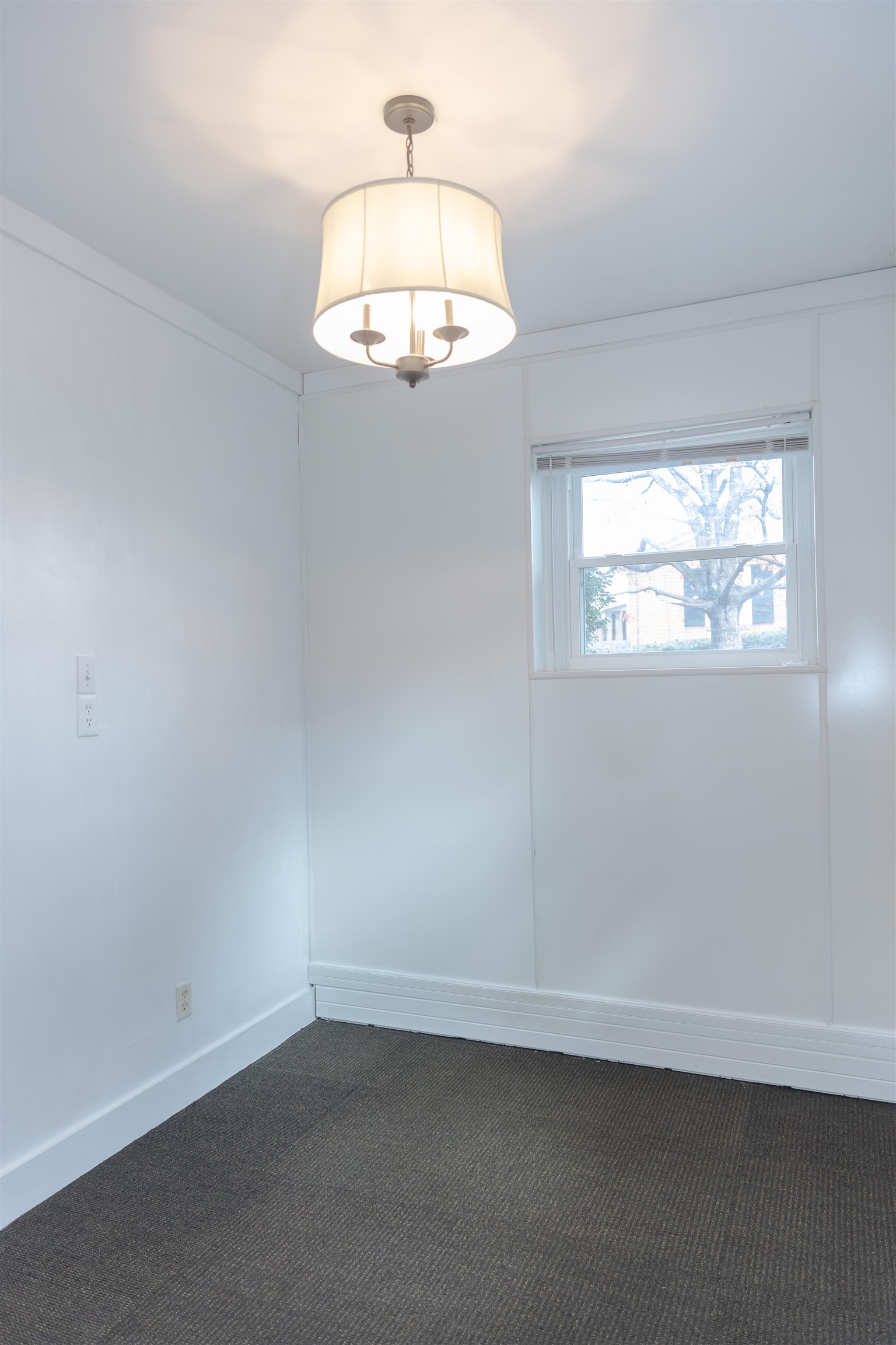 303 Summit Street Lexington, VA 24450 - Photo 43 of 58 an empty room with a window