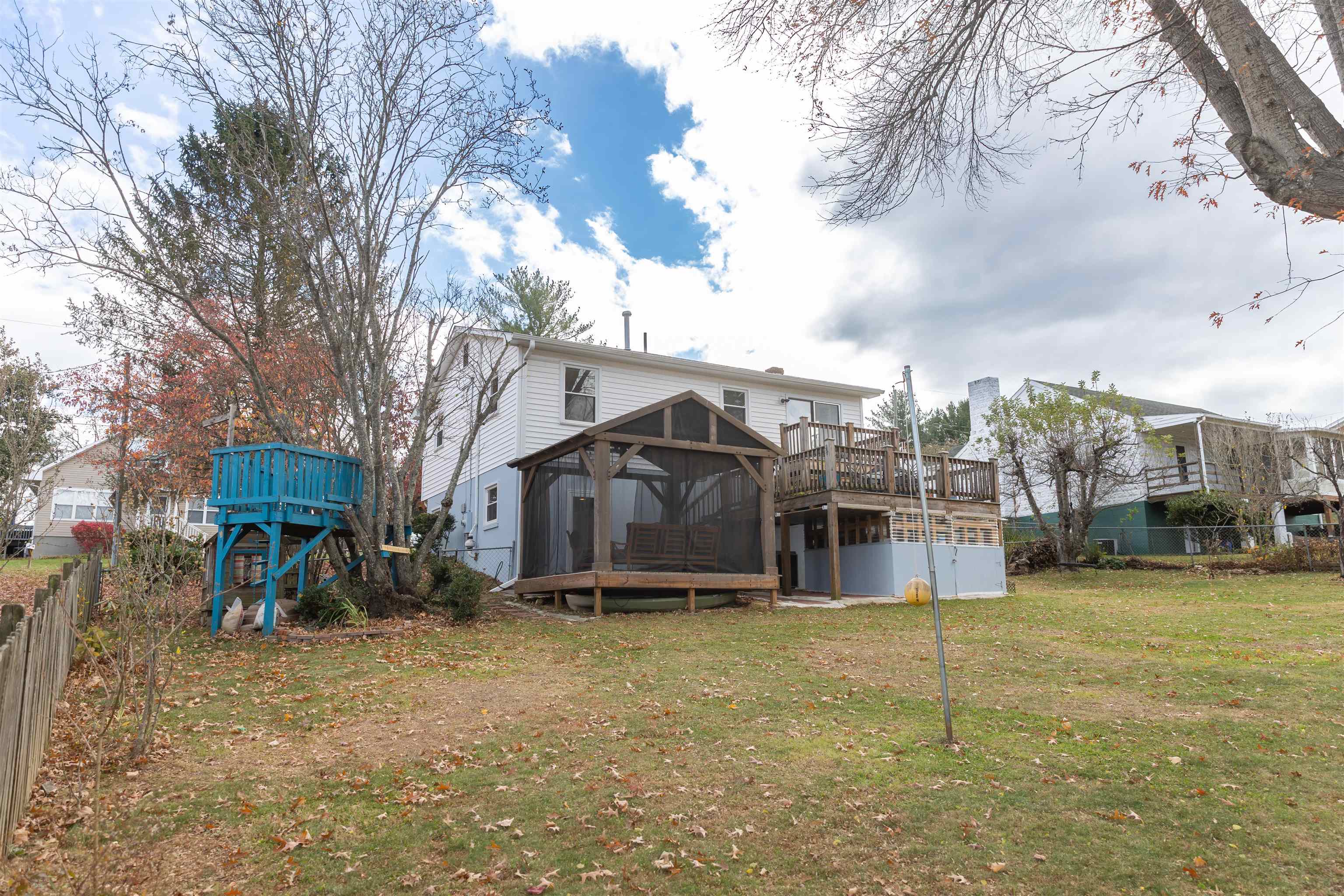 303 Summit Street Lexington, VA 24450 - Photo 44 of 58 a view of a house with a yard and sitting area