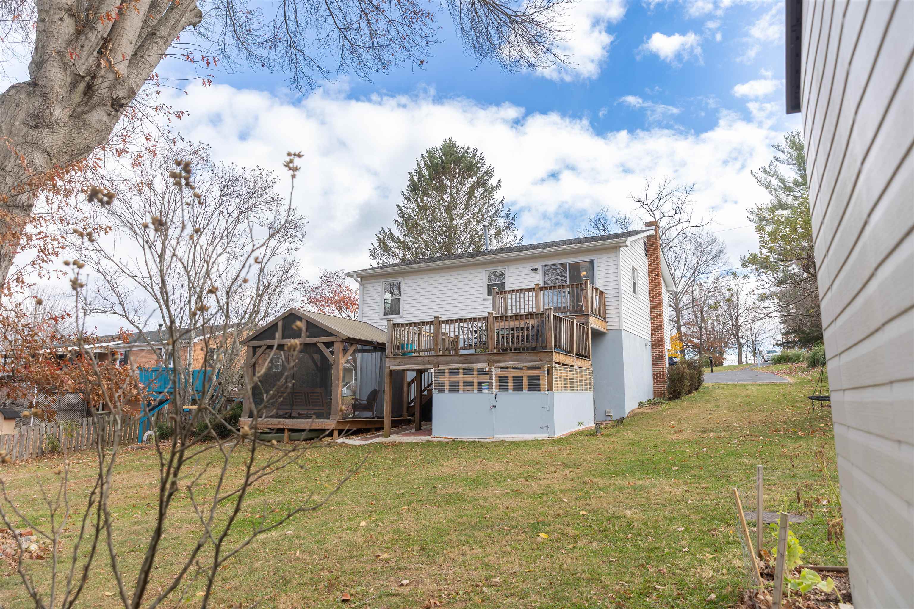 303 Summit Street Lexington, VA 24450 - Photo 47 of 58 a view of a house with a snow on the yard