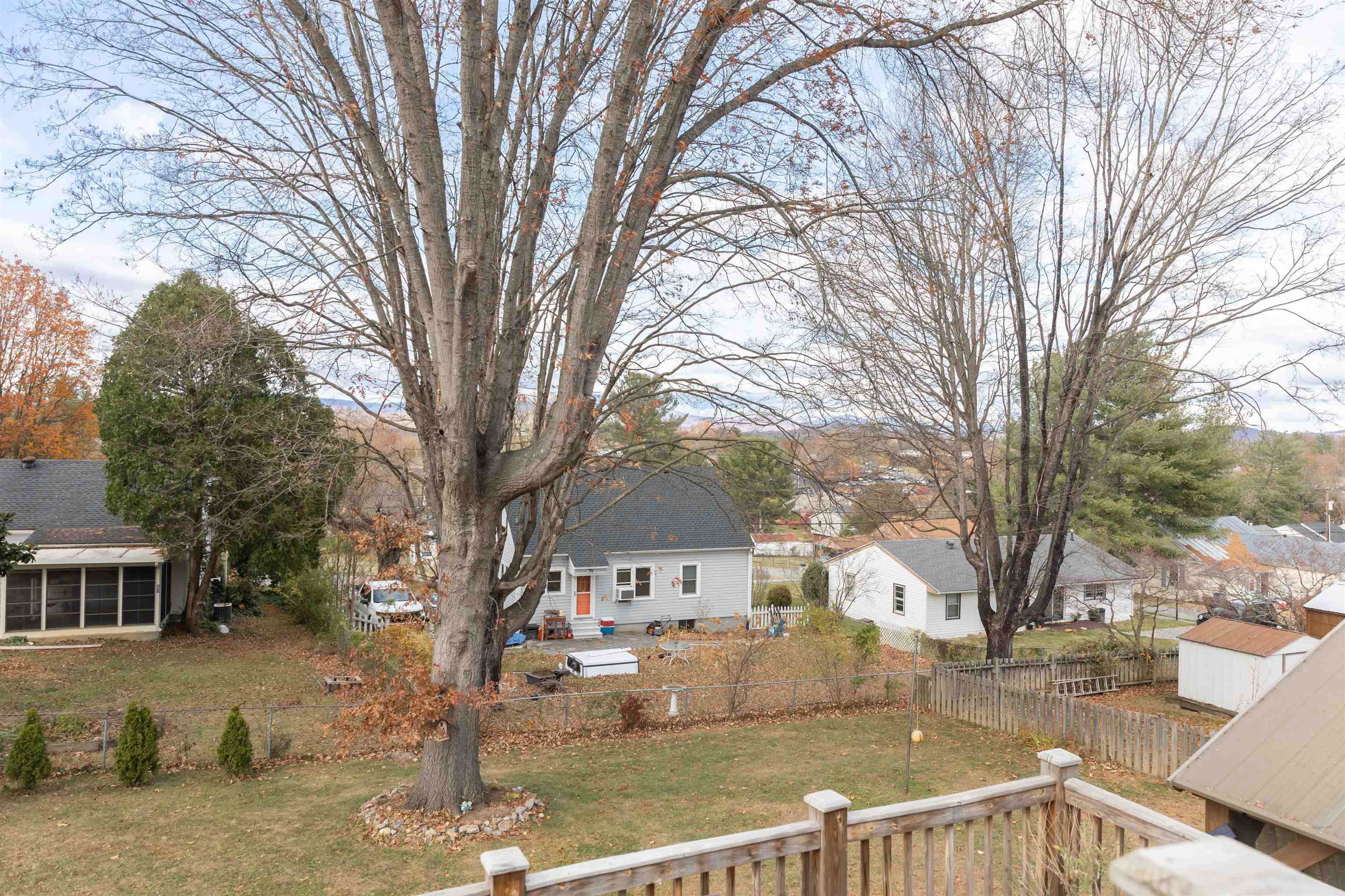 303 Summit Street Lexington, VA 24450 - Photo 51 of 58 a view of a house with a yard covered with snow in the yard