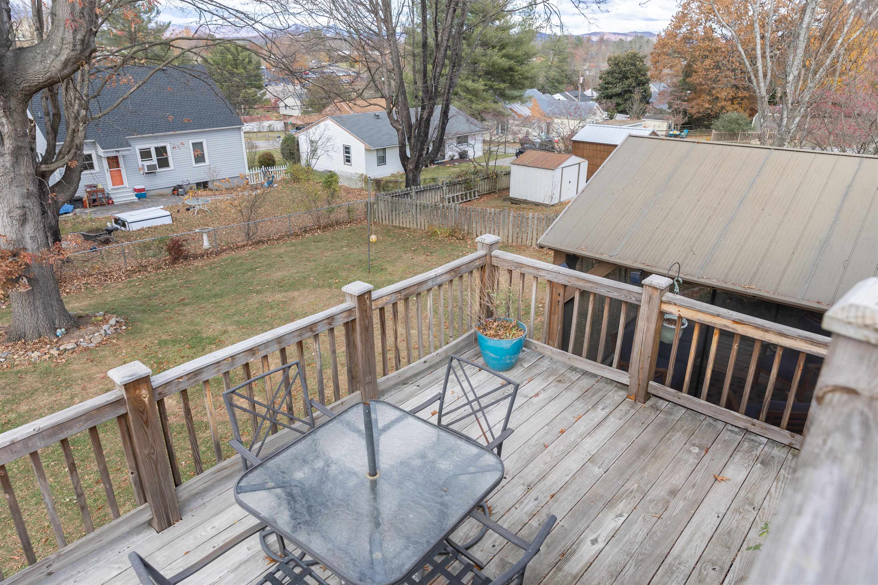 303 Summit Street Lexington, VA 24450 - Photo 52 of 58 a view of balcony with wooden floor and outdoor seating