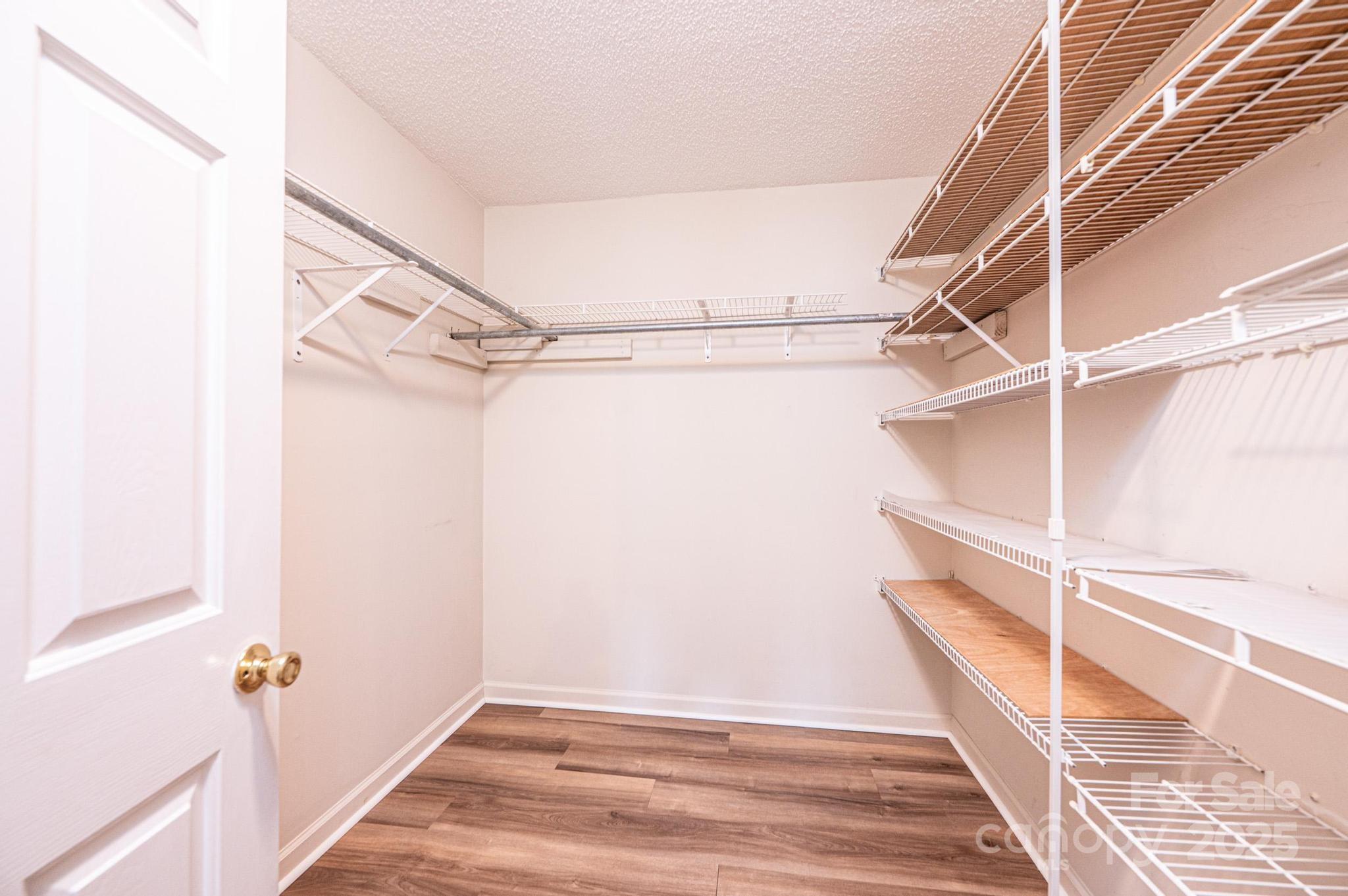 3808 River Road Hickory, NC 28602 - Photo 21 of 40 a view of an empty walk in closet
