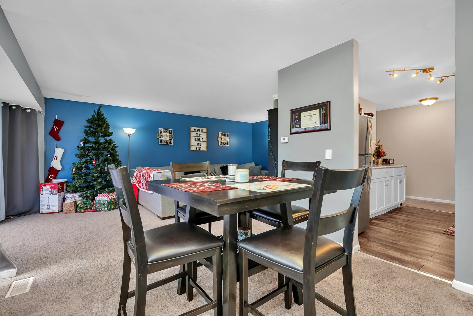 2811 Hobson Road, Unit 6 Woodridge, IL 60517 - Photo 6 of 21 a view of a dining room with furniture and wooden floor