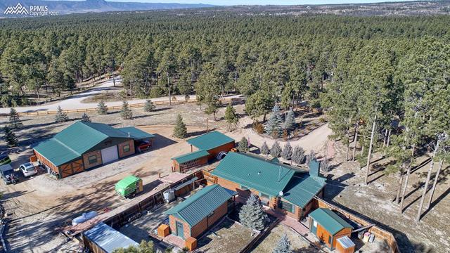 6475 Burrows Road Colorado Springs, CO 80908 - Photo 2 of 30 Workshop of dreams, romantic log cabin in the woods, rental at the back - minutes to the city. Best coffee in the world - Try the R & R coffee cafe around the corner when you visit :)