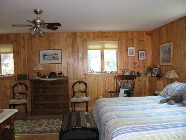 79 Bald Mountain Road Oquossoc, ME 04964 - Photo 11 of 15 Master Bedroom.